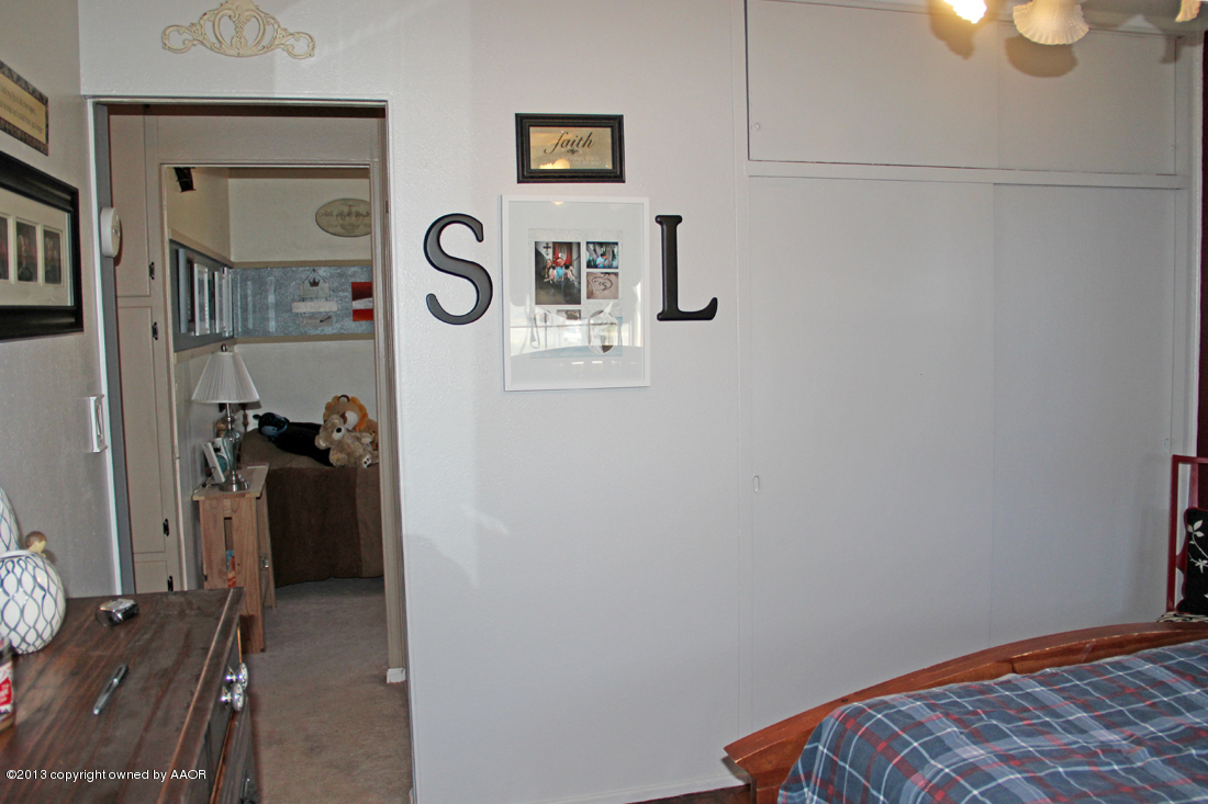5016 South Bonham Street Amarillo, TX 79110 - Photo 15 of 31 a view of walk in closet