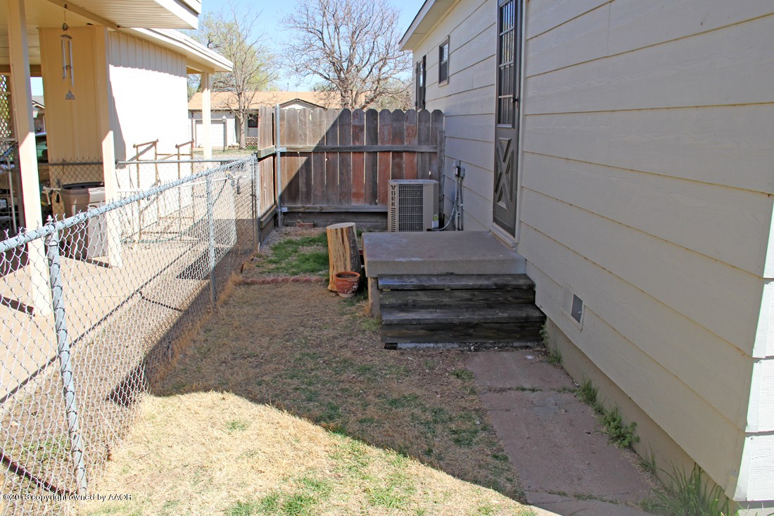 5016 South Bonham Street Amarillo, TX 79110 - Photo 24 of 31 a view of entryway with wooden floor