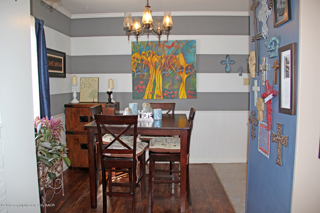 5016 South Bonham Street Amarillo, TX 79110 - Photo 9 of 31 a view of a dining room with furniture and chandelier