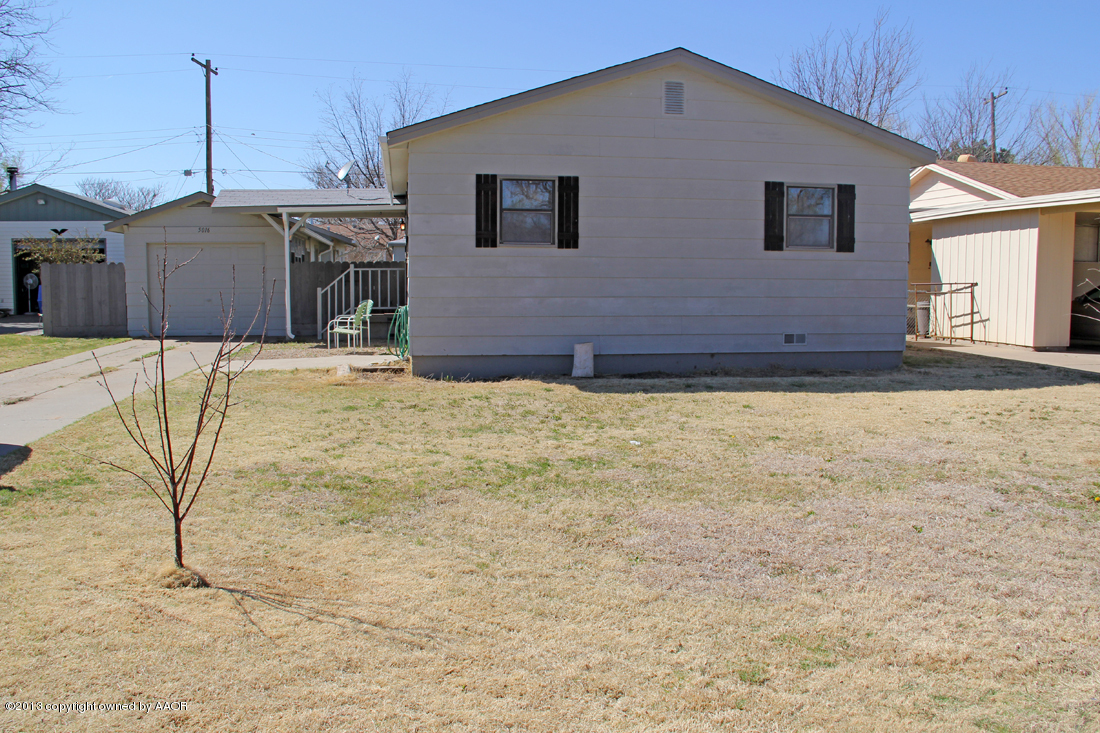 5016 South Bonham Street Amarillo, TX 79110 - Photo 10 of 31 a house view with a backyard space