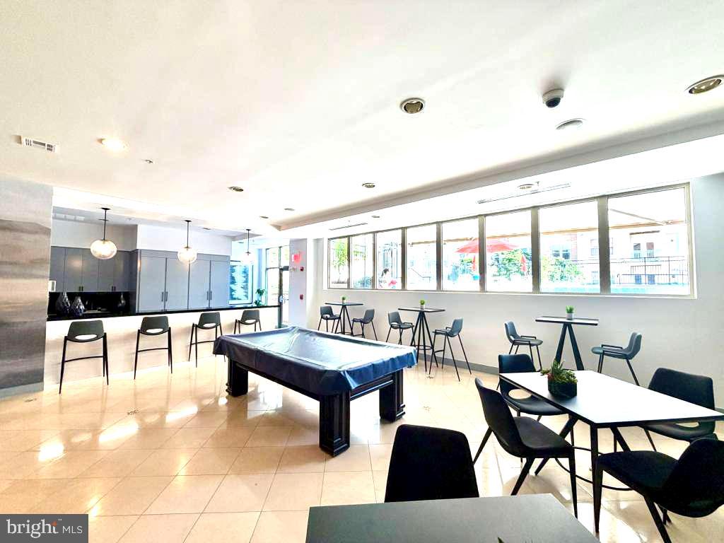 12001 Market Street, Unit 177 Reston, VA 20190 - Photo 37 of 63 Community Room and Pool Table