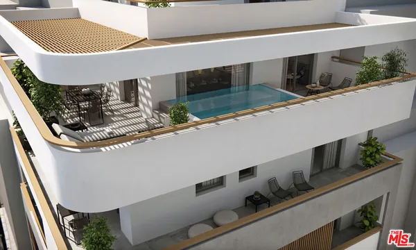 a view of balcony with washer and dryer