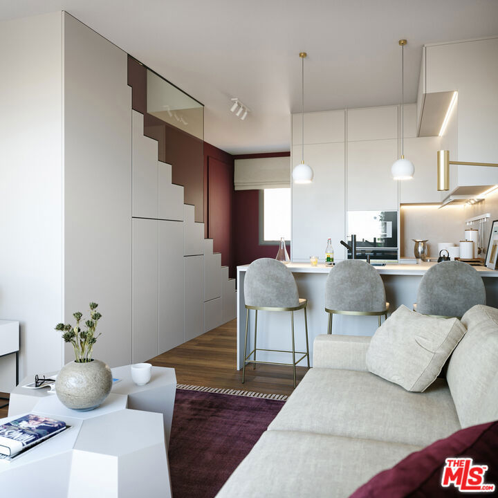 5 Pindou & Kithnou Athens Greece undefined, undefined 0 - Photo 7 of 14 a living room with furniture and a potted plant