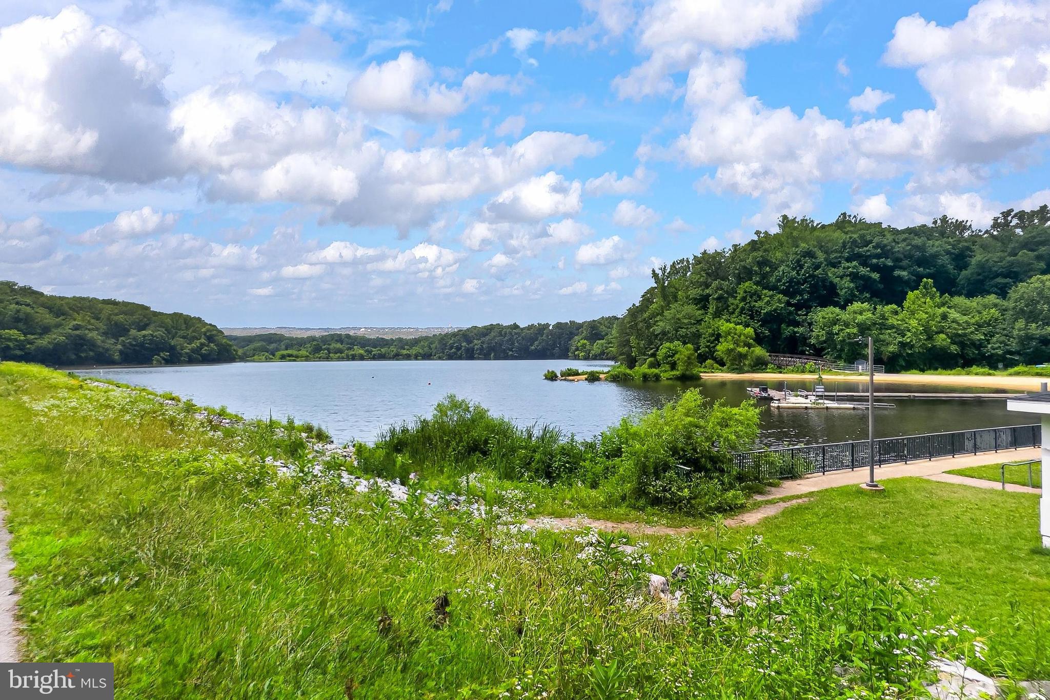 7604 Boulder Street Springfield, VA 22151 - Photo 22 of 39 a view of a lake with houses in the back