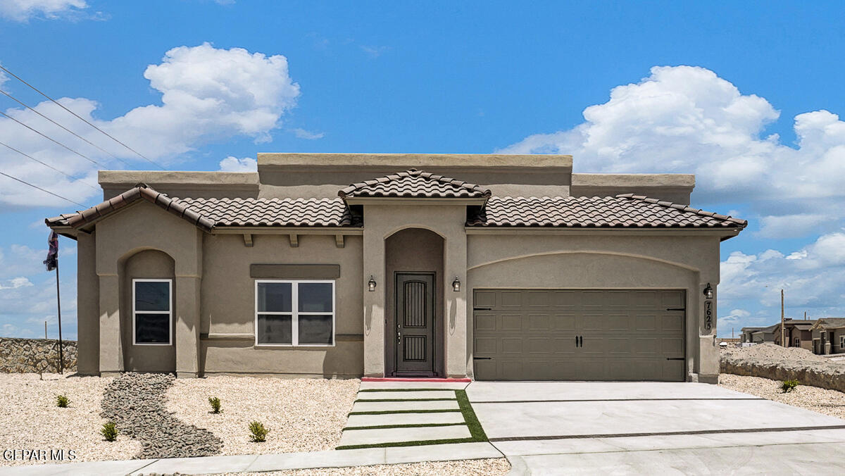 7625 Enchanted Ridge Drive El Paso, TX 79911 - Photo 2 of 57 a view of a house with a dry yard