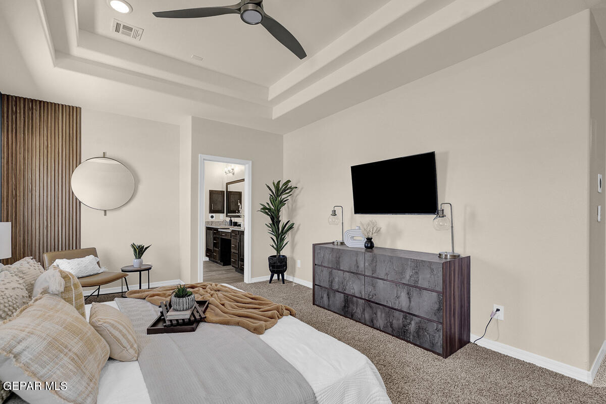 7625 Enchanted Ridge Drive El Paso, TX 79911 - Photo 46 of 57 a living room with furniture a flat screen tv and a chandelier
