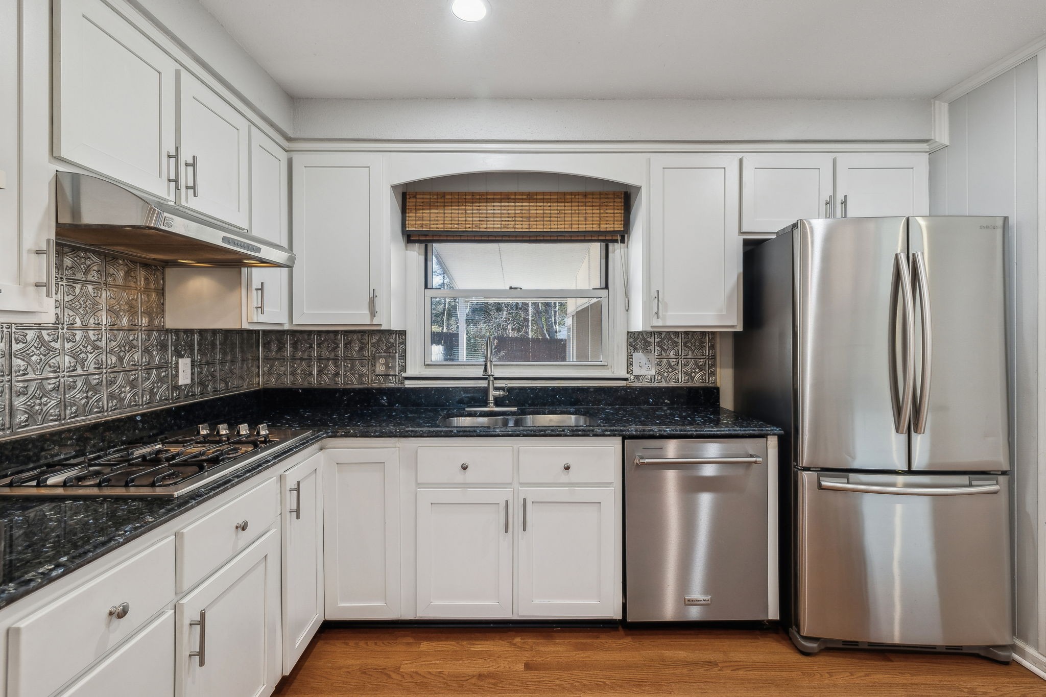 4 Trahern Terrace Clarksville, TN 37040 - Photo 13 of 66 a kitchen with granite countertop a refrigerator and a sink