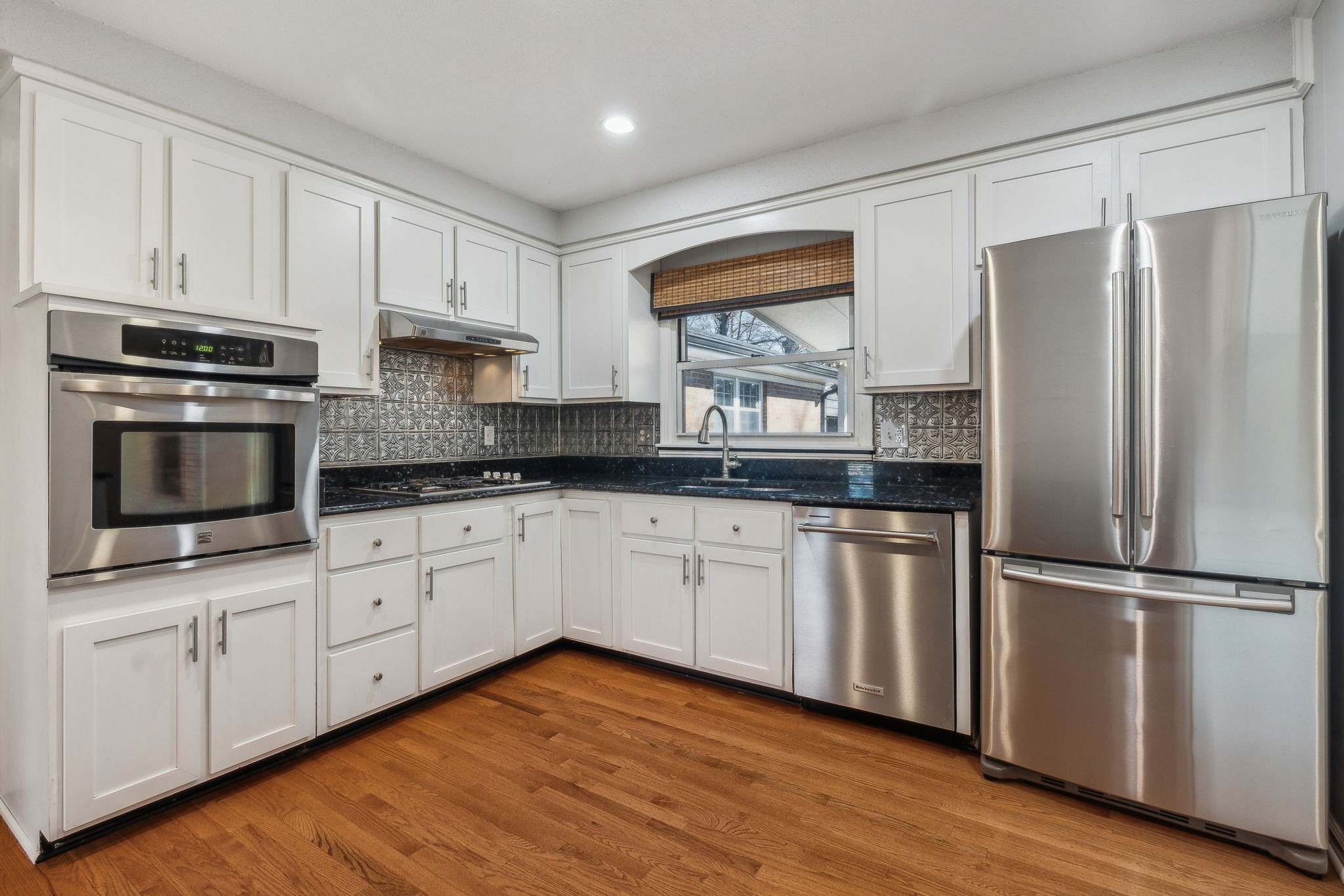 4 Trahern Terrace Clarksville, TN 37040 - Photo 14 of 66 a kitchen with stainless steel appliances granite countertop a refrigerator sink and microwave