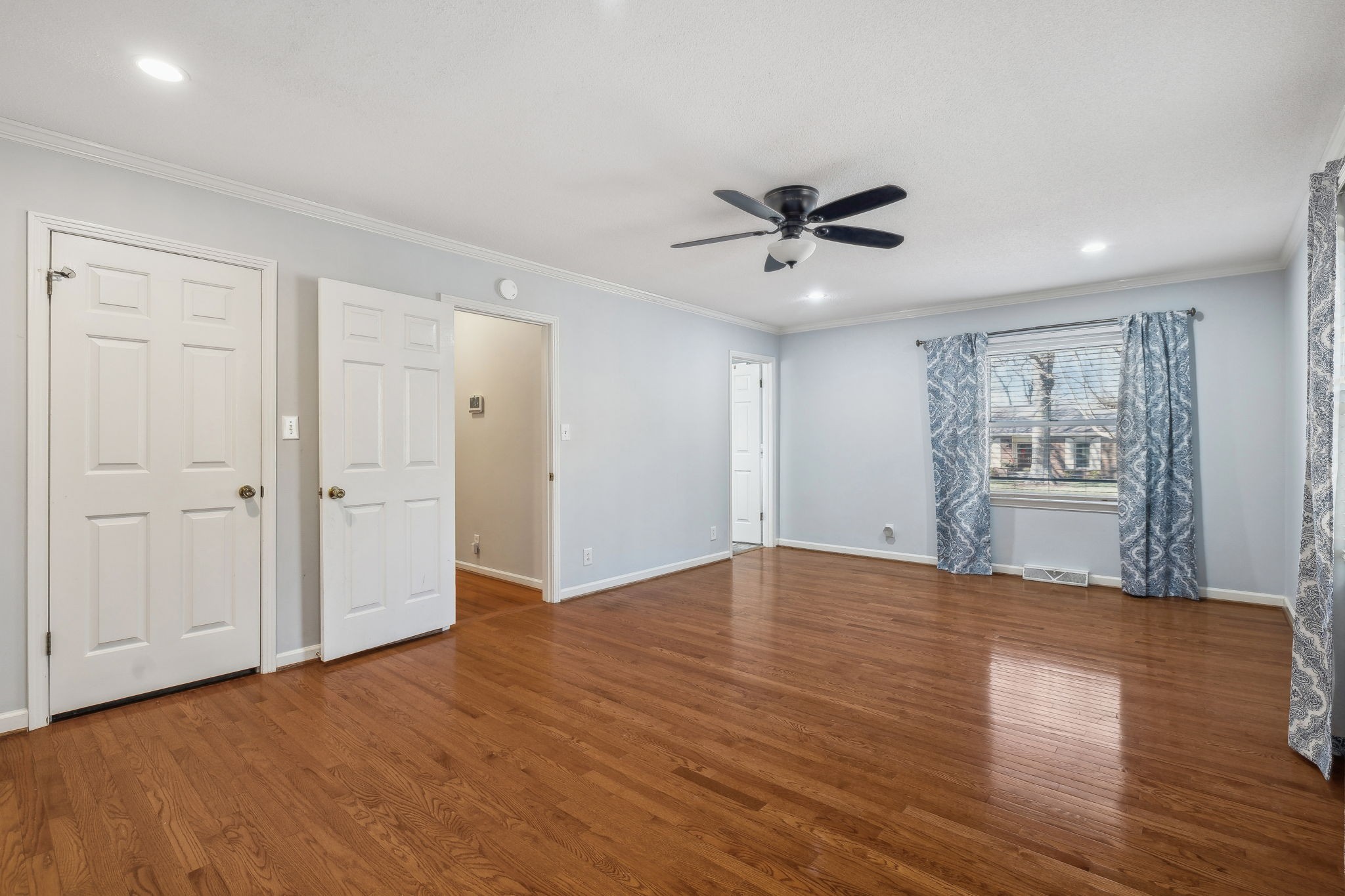 4 Trahern Terrace Clarksville, TN 37040 - Photo 25 of 66 a view of an empty room with a window and wooden floor