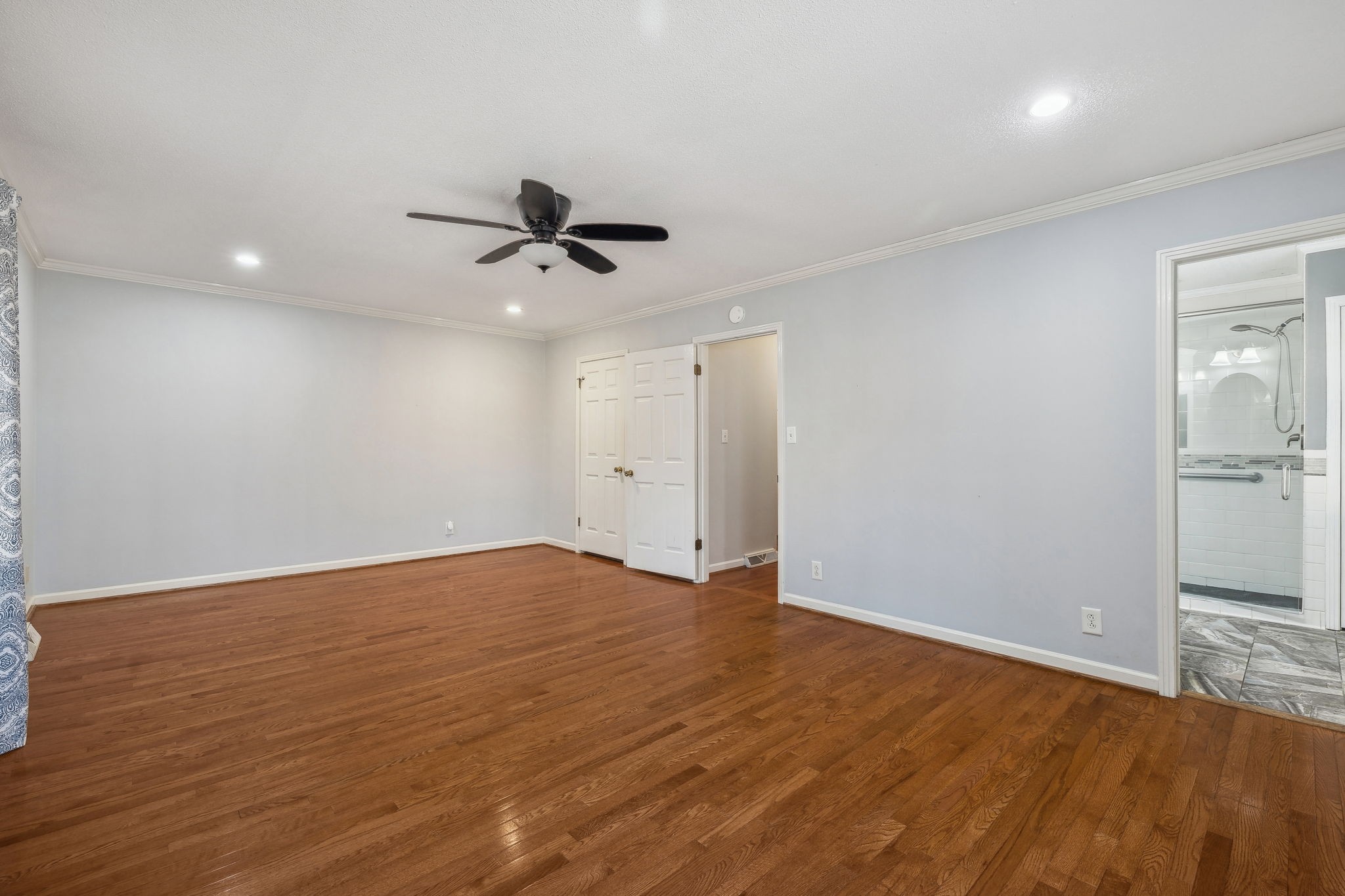 4 Trahern Terrace Clarksville, TN 37040 - Photo 26 of 66 a view of an empty room with a window and wooden floor
