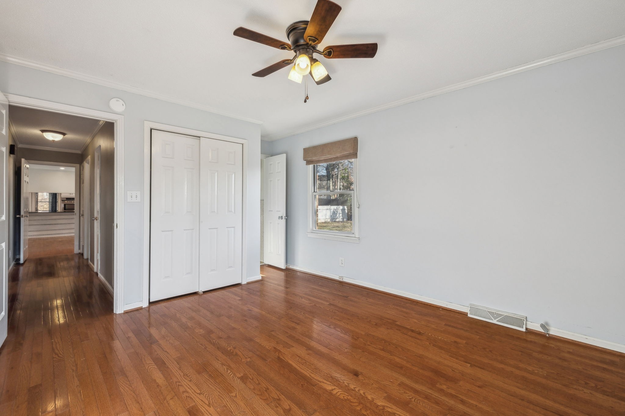 4 Trahern Terrace Clarksville, TN 37040 - Photo 34 of 66 an empty room with wooden floor a ceiling fan and closet