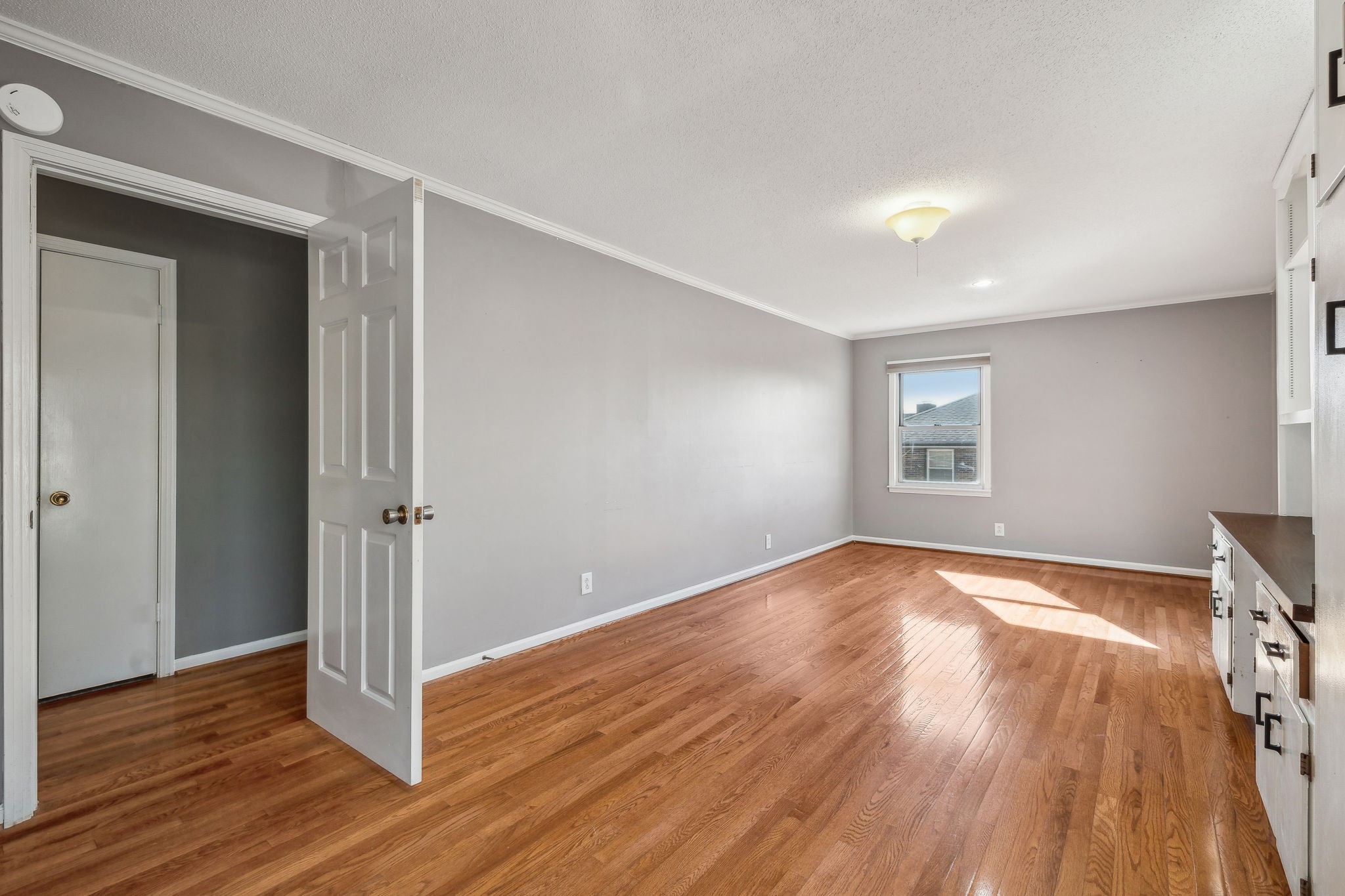 4 Trahern Terrace Clarksville, TN 37040 - Photo 39 of 66 a view of an empty room with wooden floor and a window