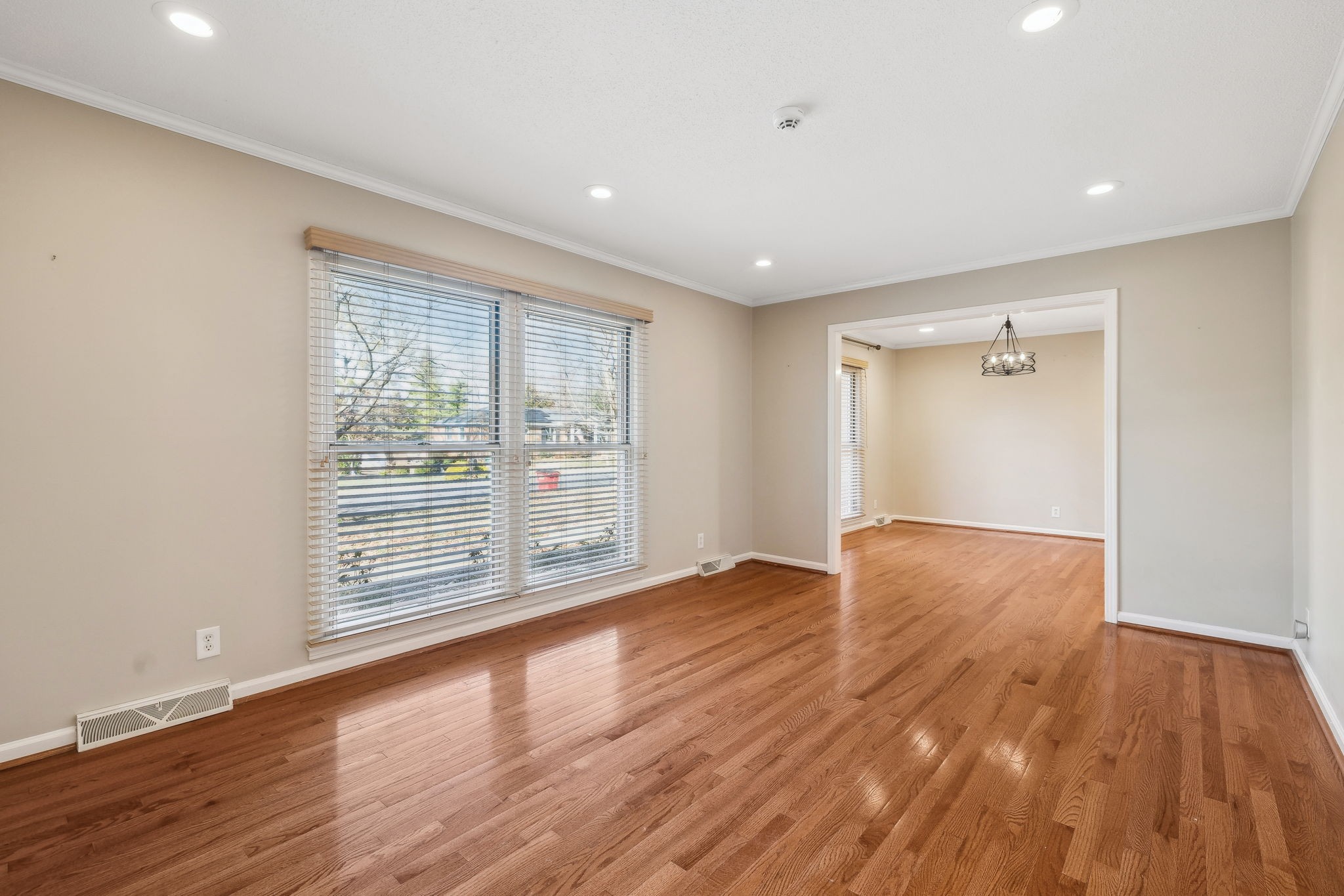 4 Trahern Terrace Clarksville, TN 37040 - Photo 7 of 66 a view of an empty room with wooden floor and a window