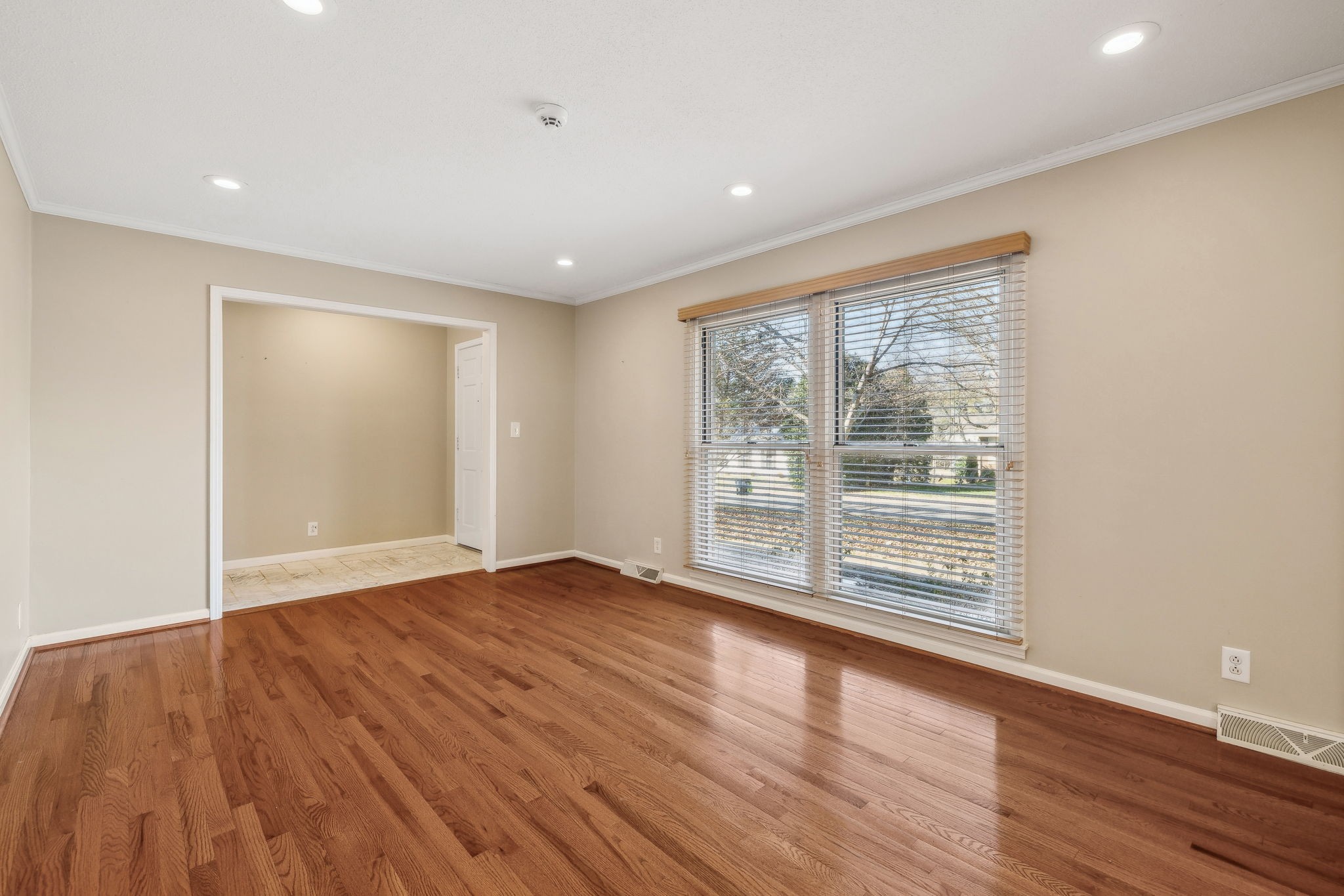 4 Trahern Terrace Clarksville, TN 37040 - Photo 9 of 66 a view of an empty room with wooden floor and a window