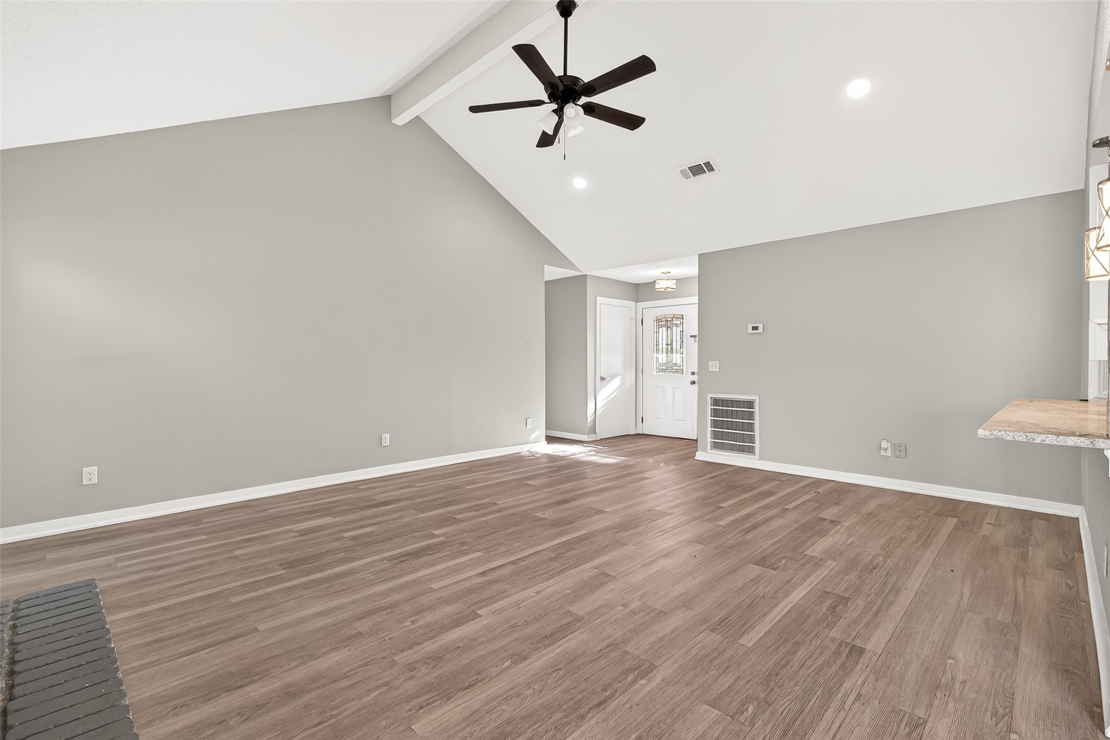 9507 Secretariat Drive Houston, TX 77065 - Photo 15 of 41 a view of empty room with wooden floor