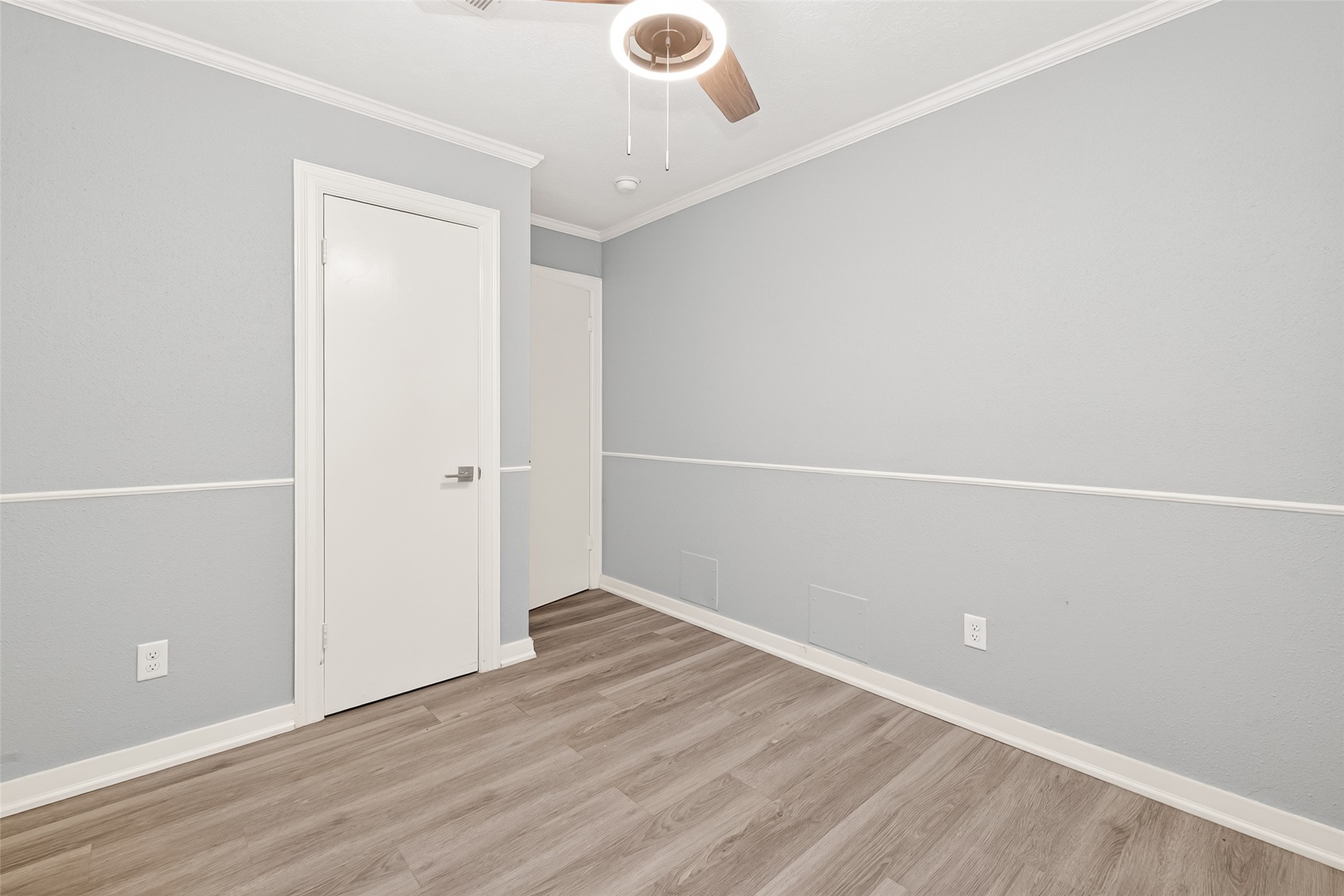9507 Secretariat Drive Houston, TX 77065 - Photo 31 of 41 an empty room with wooden floor