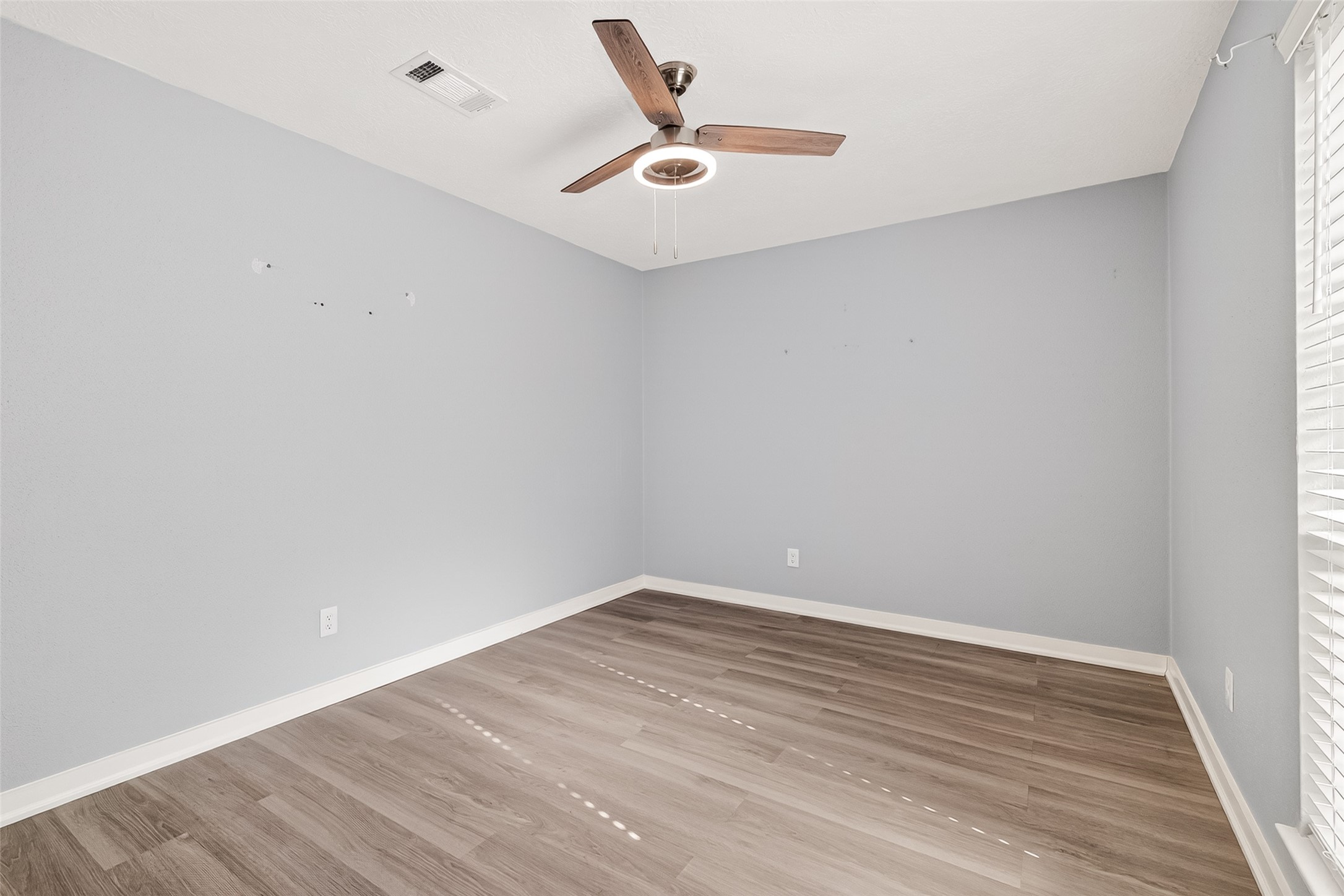 9507 Secretariat Drive Houston, TX 77065 - Photo 34 of 41 wooden floor in a empty room