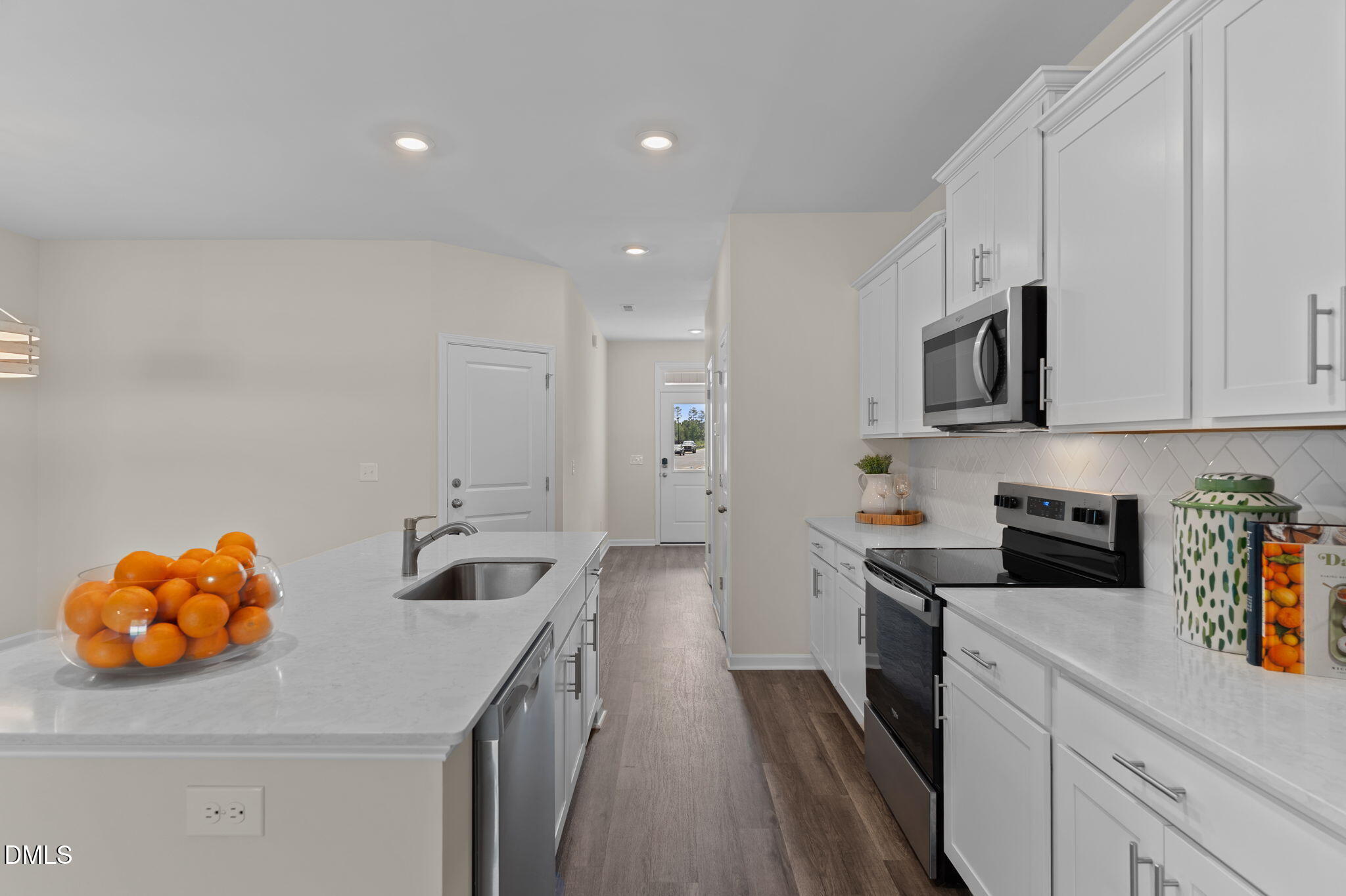 212 Kerag Way Garner, NC 27529 - Photo 11 of 28 a kitchen that has a sink and cabinets
