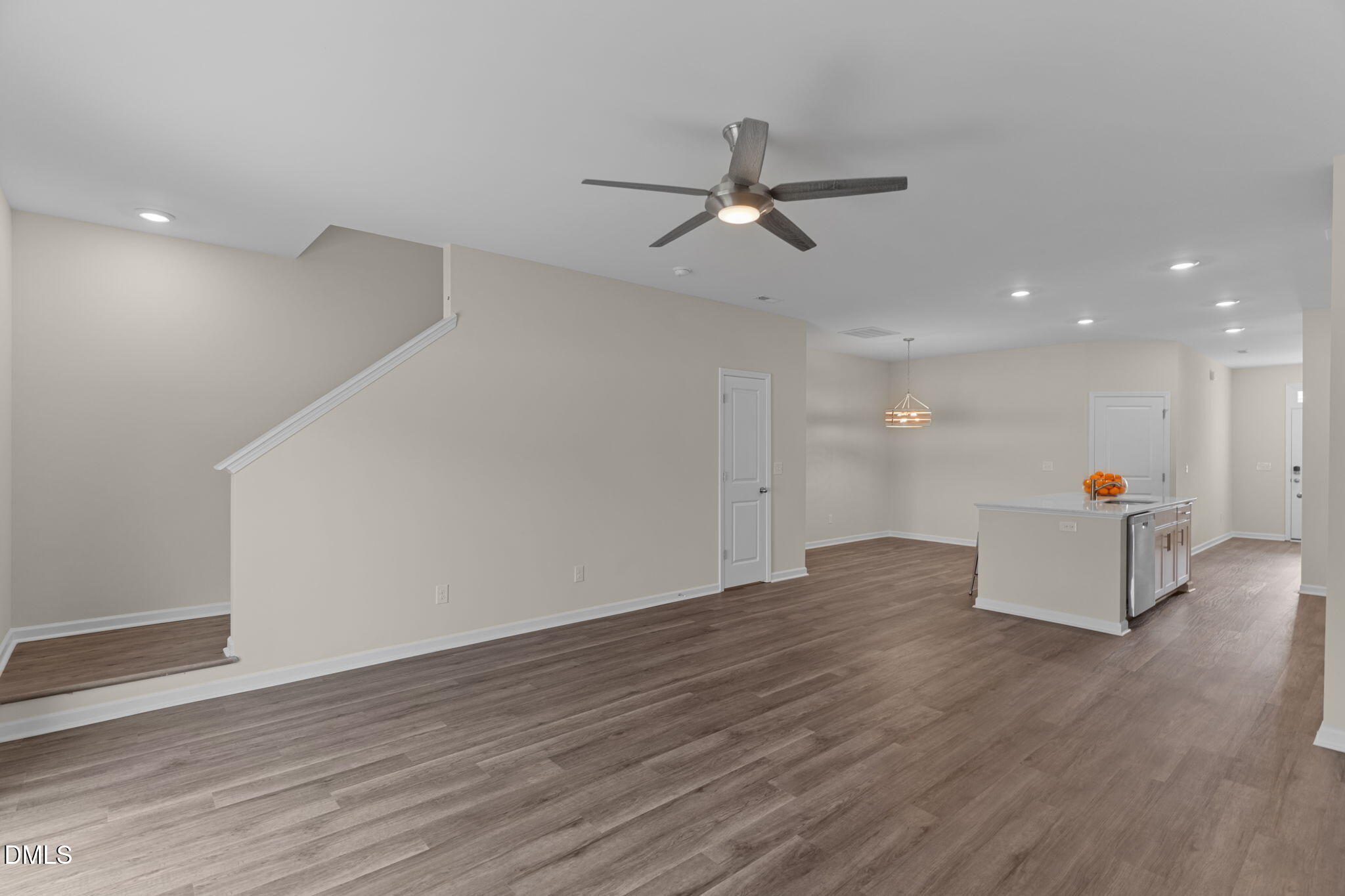 212 Kerag Way Garner, NC 27529 - Photo 15 of 28 a view of empty room with wooden floor