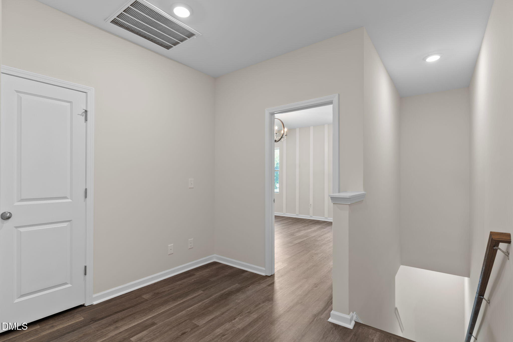 212 Kerag Way Garner, NC 27529 - Photo 17 of 28 a view of empty room with wooden floor