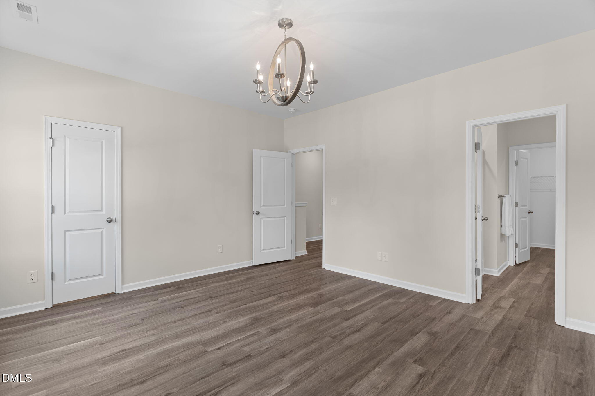212 Kerag Way Garner, NC 27529 - Photo 20 of 28 a view of empty room with wooden floor