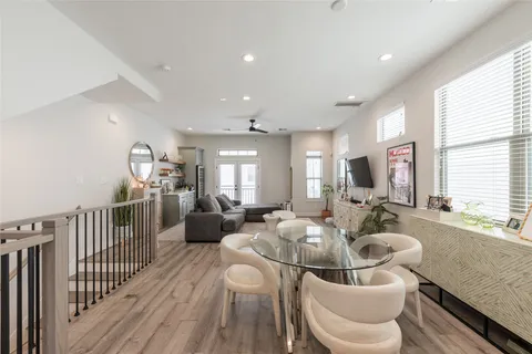 a kitchen with a sink a refrigerator a stove a microwave oven a sink and dishwasher