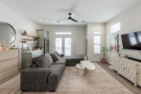 a bathroom with a tub a sink and mirror