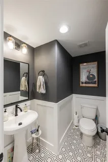 a view of a backyard with wooden fence