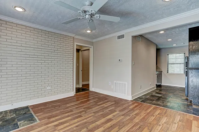 a view of livingroom with hardwood floor and hallway
