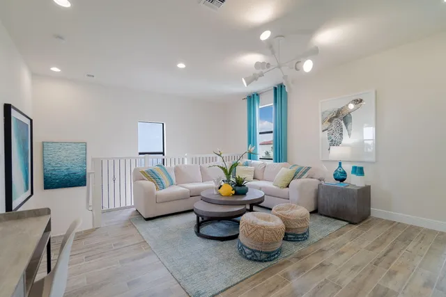 a view of a room with wooden floor
