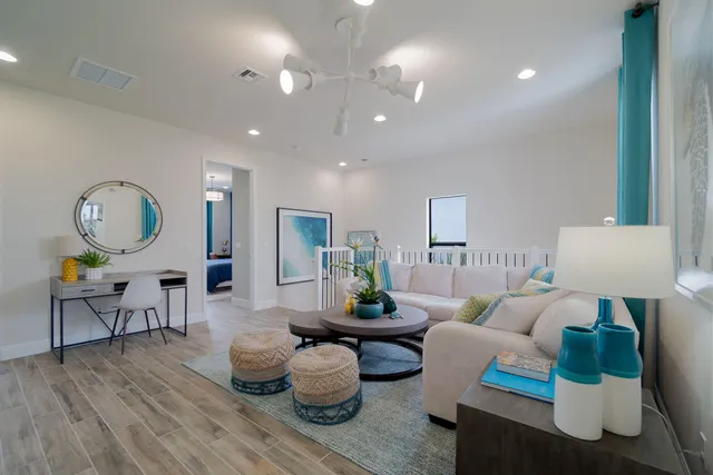 a bathroom with a double vanity sink mirror and shower