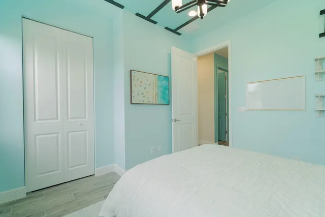 a view of a chairs and table in the backyard