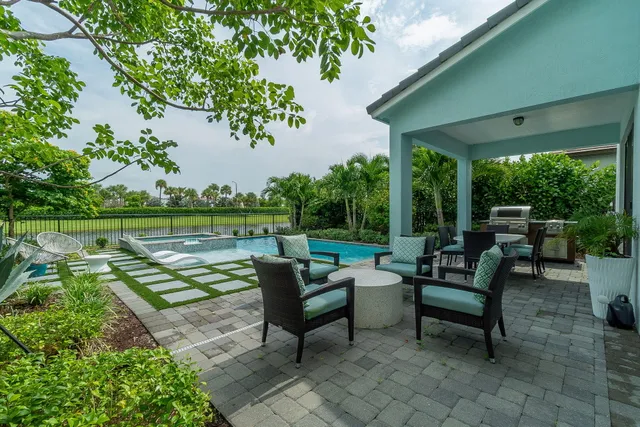 an aerial view of residential house with outdoor space