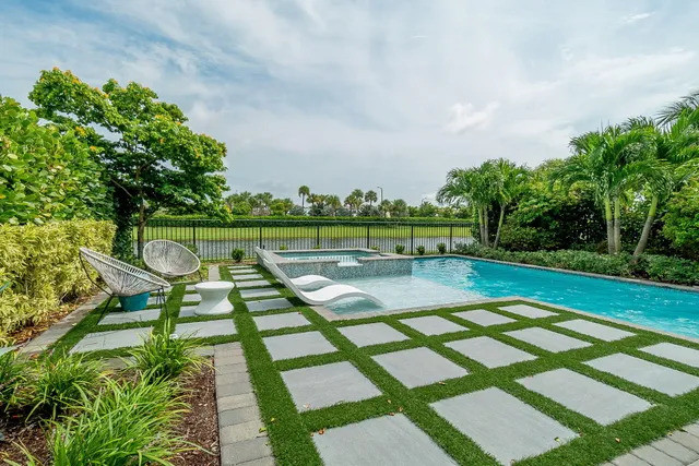 a front view of a building with garden