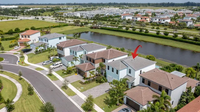 a view of a lake with a big yard