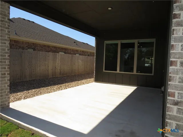 a house view with a garden space