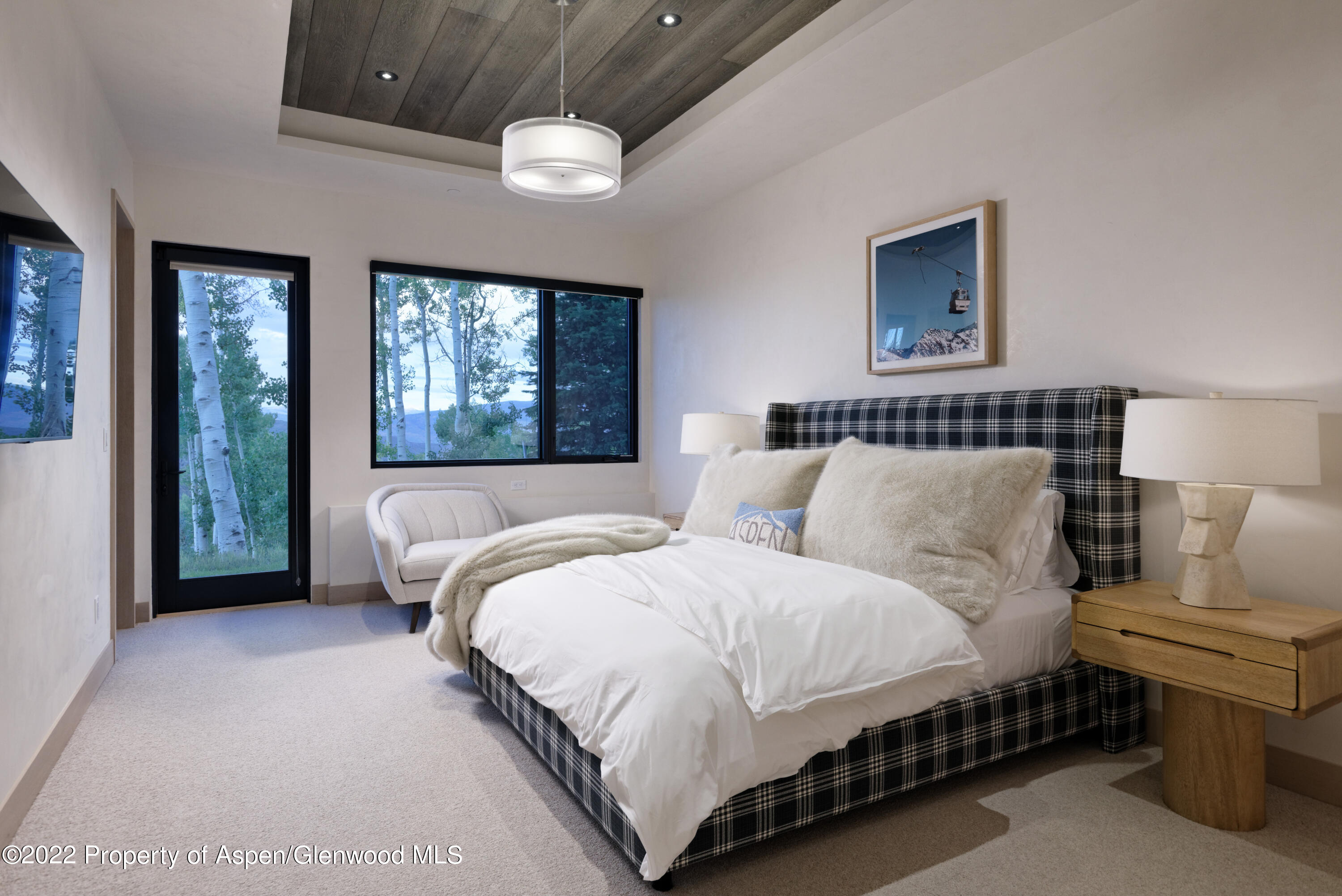144 Bridge Lane Snowmass Village, CO 81615 - Photo 12 of 28 a bedroom with a bed and window