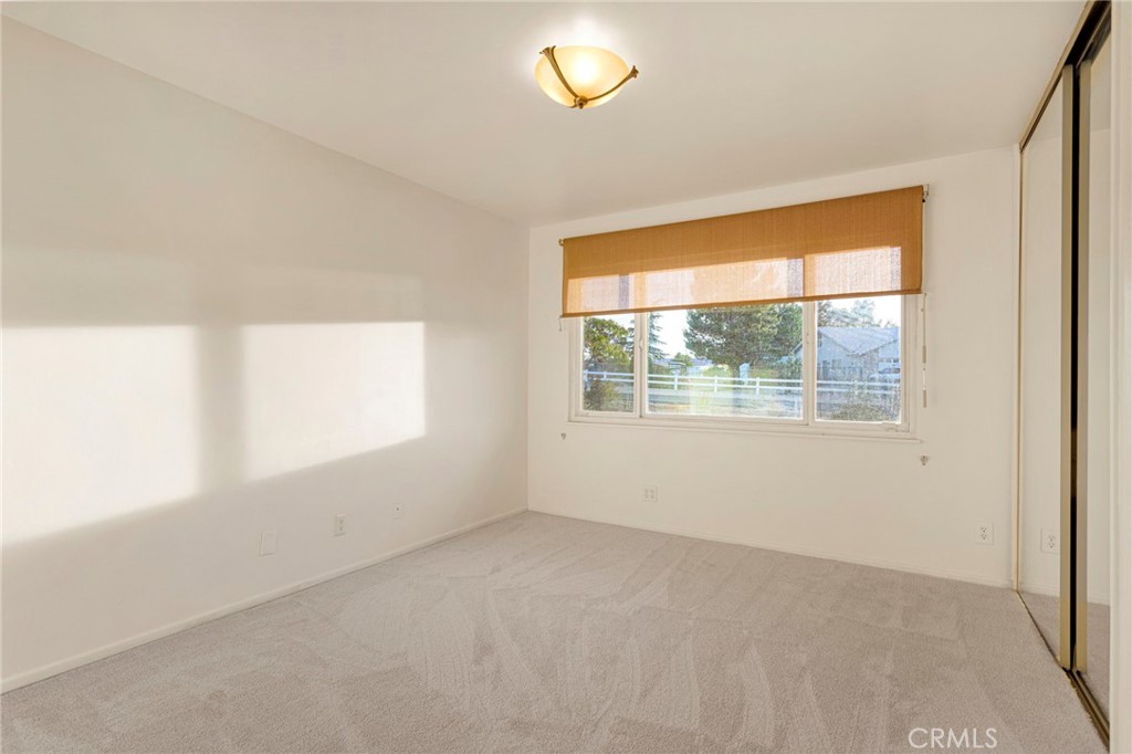 15177 Mendota Road North Apple Valley, CA 92307 - Photo 27 of 50 an empty room with a window