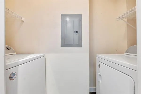 a utility room with dryer and washer