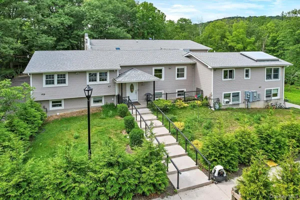 a aerial view of a house with garden