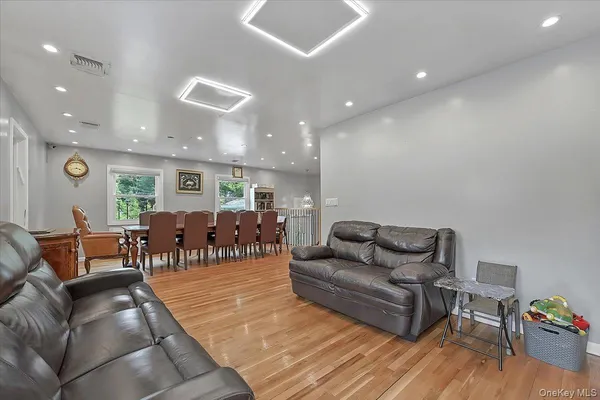 a view of a dining room with furniture window and outside view