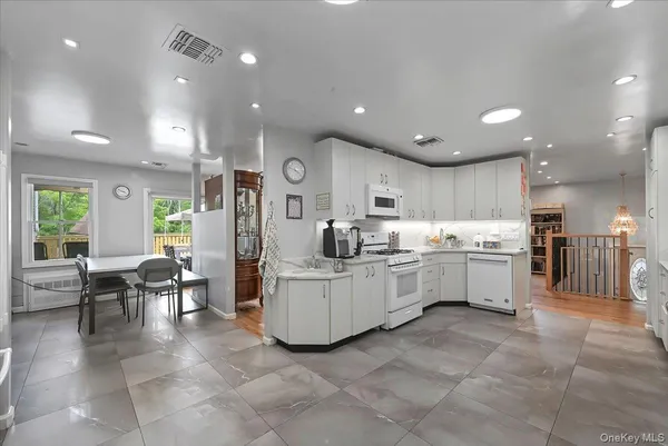 a living room with furniture and gym equipment