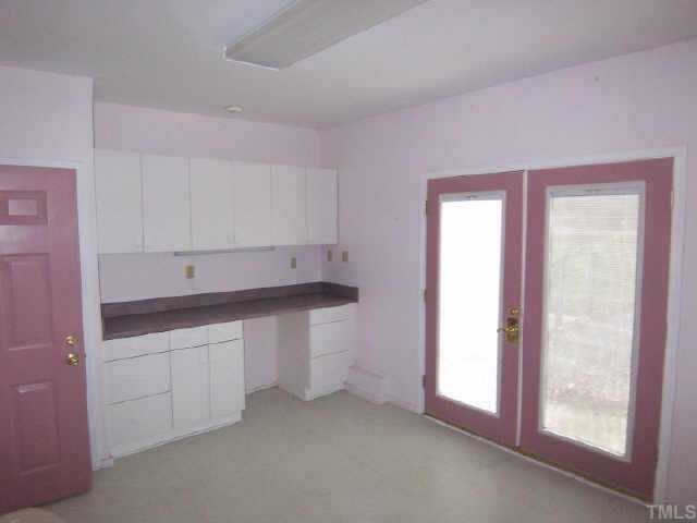 5909 Lake Elton Road Durham, NC 27713 - Photo 7 of 9 Garage was converted to office and work/hobby area and has separate entrance. Perfect for home based business. Combined with hobby room, this adds 445 square feet to home not included in living area for a total of 2,114 square feet.