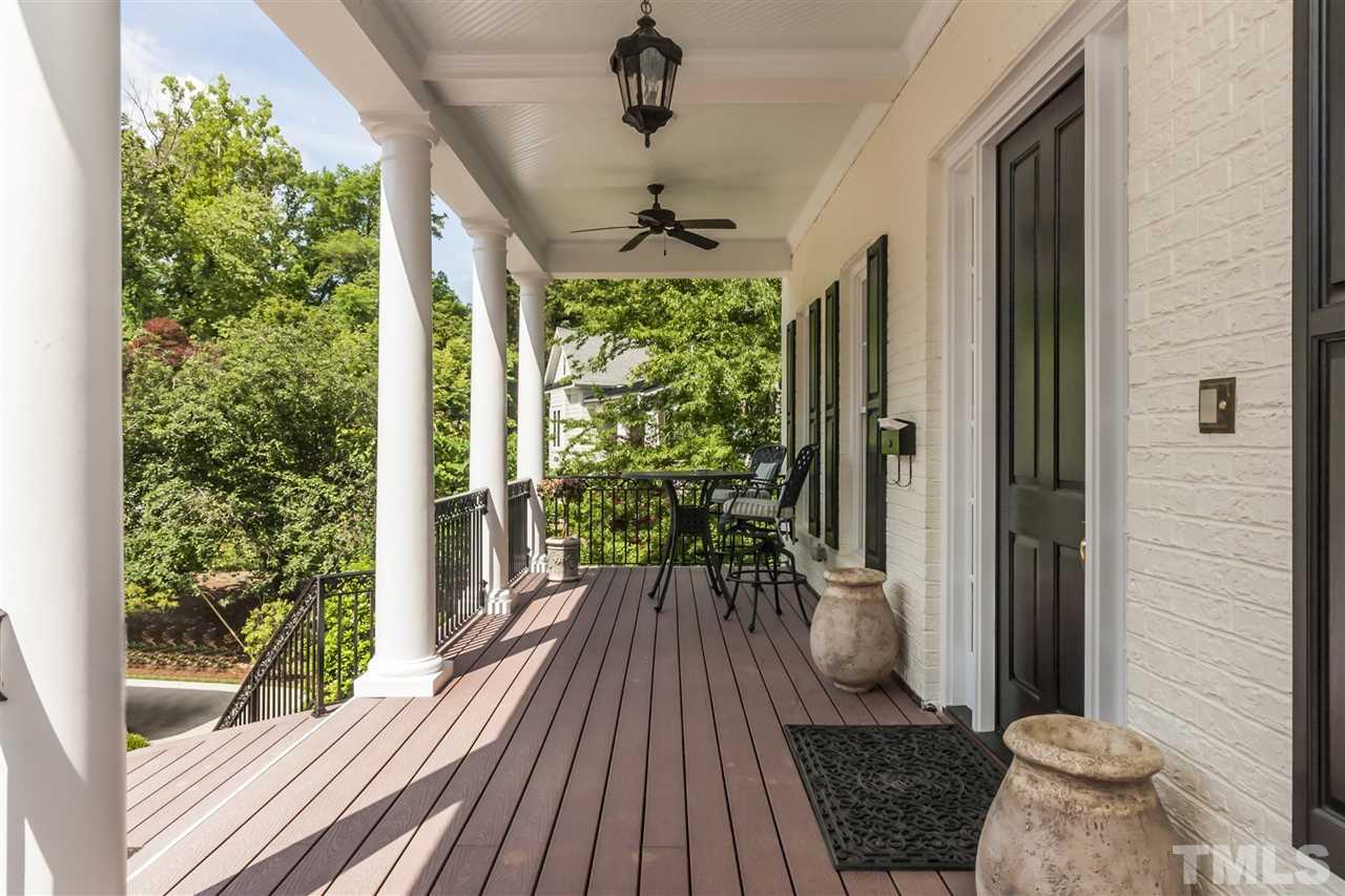 2933 Claremont Road Raleigh, NC 27608 - Photo 2 of 25 a view of balcony with wooden floor and outdoor space