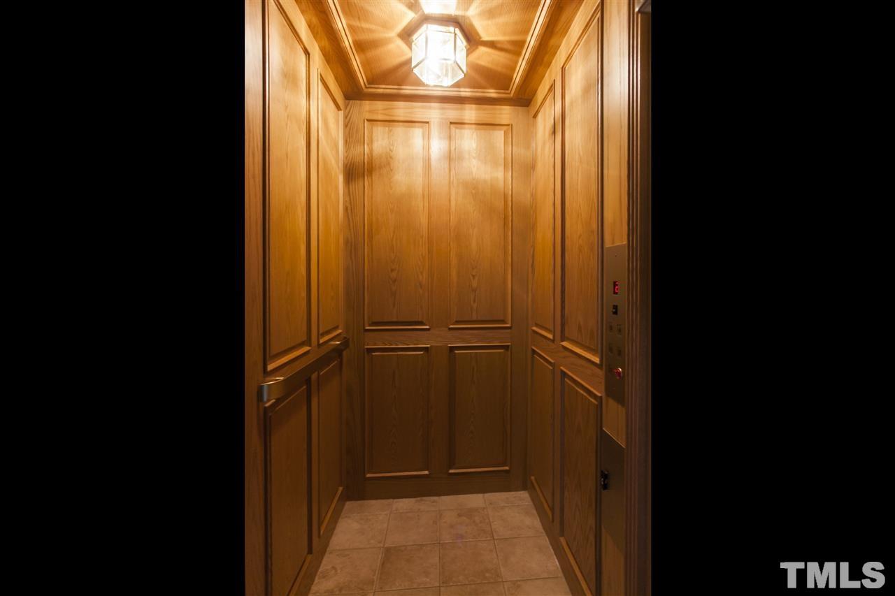 2933 Claremont Road Raleigh, NC 27608 - Photo 22 of 25 a view of a wardrobe