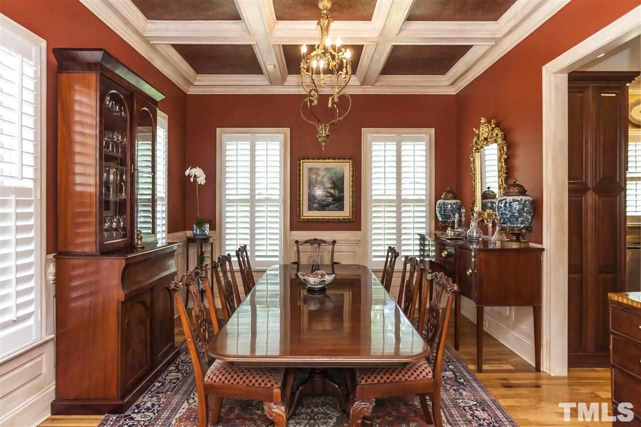 2933 Claremont Road Raleigh, NC 27608 - Photo 4 of 25 a view of a dining room with furniture window and wooden floor
