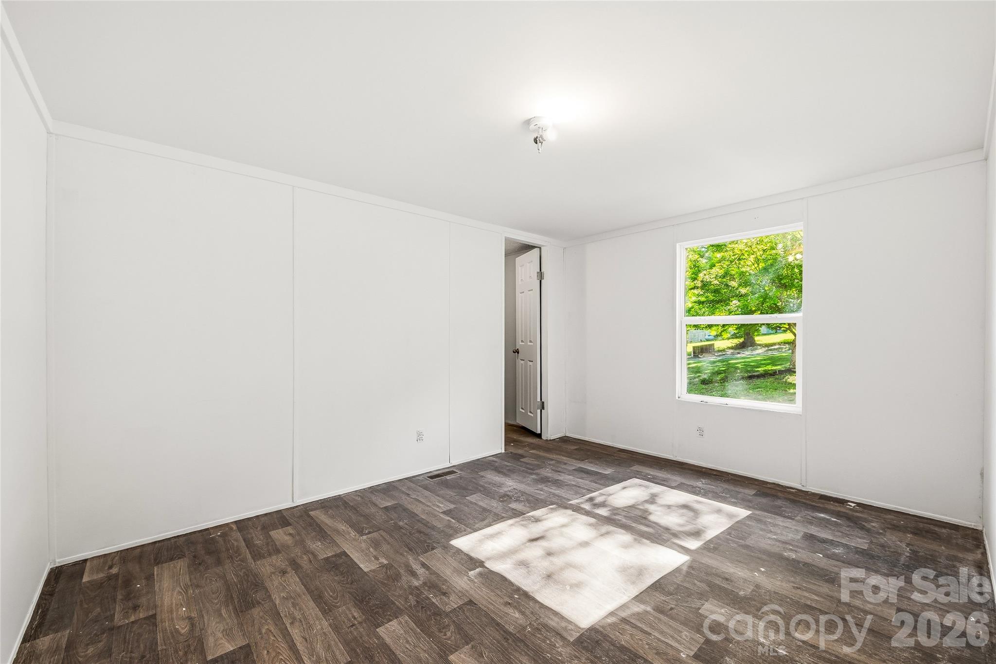 45 Alan Retreat Road Hendersonville, NC 28792 - Photo 23 of 25 an empty room with window