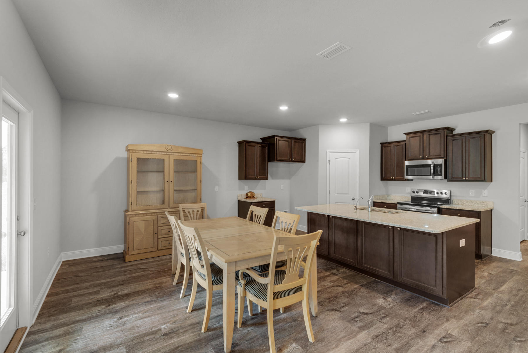 214 Southern Pines Road Santa Rosa Beach, FL 32459 - Photo 13 of 27 a view of a dining room with furniture and wooden floor