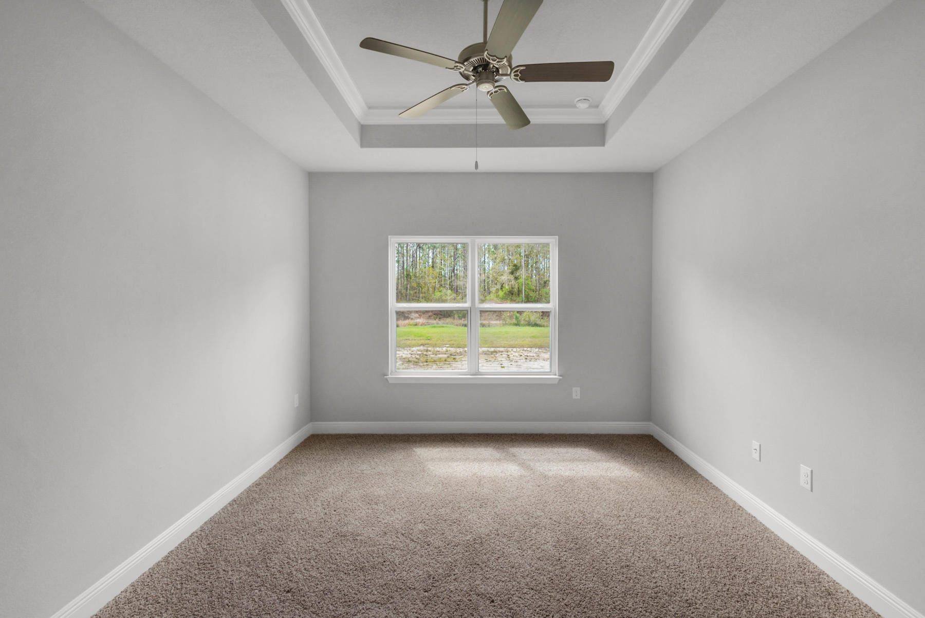 214 Southern Pines Road Santa Rosa Beach, FL 32459 - Photo 17 of 27 an empty room with a window and a fan