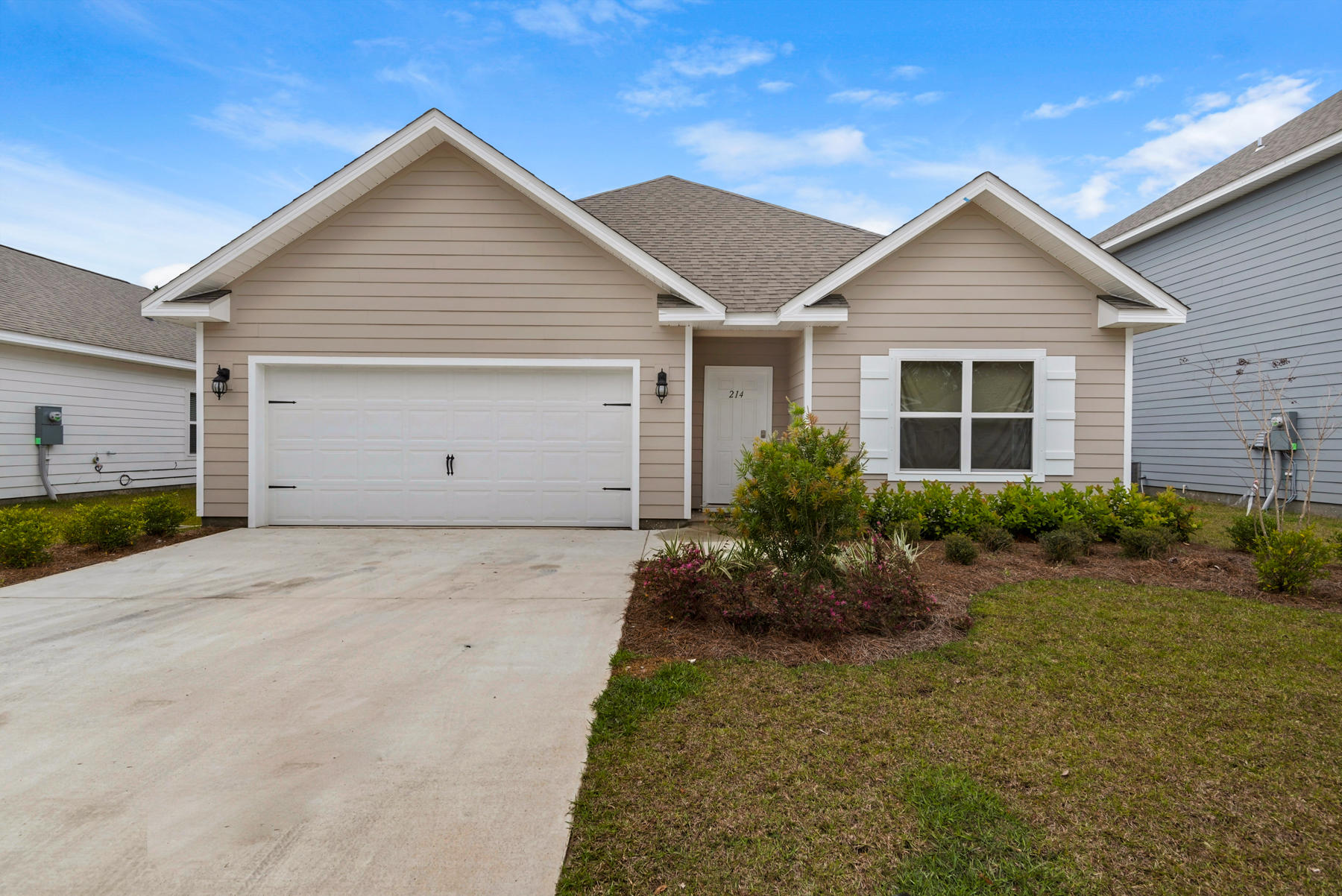 214 Southern Pines Road Santa Rosa Beach, FL 32459 - Photo 2 of 27 a view of a house with a yard